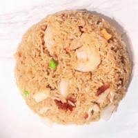Fried Rice With Shrimp · Cooked with white rice, service with onion, pea, carrot.