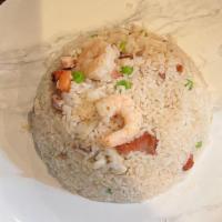 Fried Rice With Combo · Cooked with white rice, service with onion, pea, carrot. Chicken, pork & shrimp.