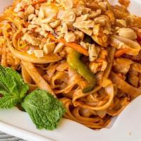 Pad Thai · Stir-fried Thai rice noodle with egg. onion, bean sprout, red & green pepper and peanut & li...