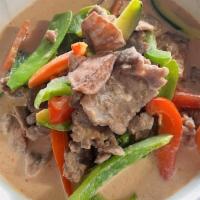 Red Panang Curry Style · Hot & spicy. Carrot, zucchini, snow pea, red & green pepper, potatoes with coconut milk & re...