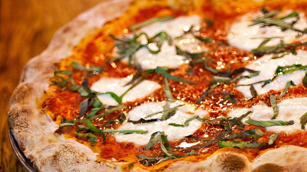 Margherita · Red sauce and fresh Mozzarella, finished with a drizzle of olive oil, pinch of sea salt and fresh basil.