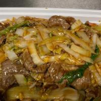 Beef Chow Mein · Served with crispy noodle and white rice.