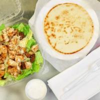 Caesar Salad With Grilled Chicken · Served with dressing on the side.