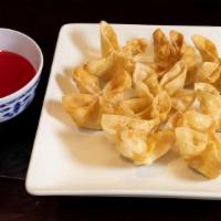 Ap/L. Crab Cheese Wontons 蟹饺 · A delightful treat of crab and cream cheese wrapped in a wonton wrapper and fried to a golde...