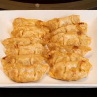 Ap/D. Fried Dumplings 炸饺子 · Folded with pork and vegetable filling, deep-fried to perfection! 10 pieces.
