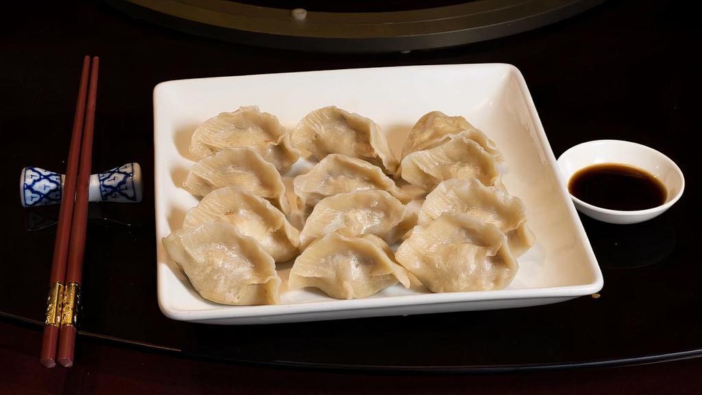 Ap/I. Steamed Dumplings 水饺 · Beautifully handmade steamed dumplings with pork and vegetable filling. 12 pieces.
