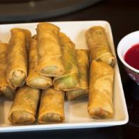 Ap/A-1. Egg Roll 蔬菜春卷 · Crunchy, crispy egg rolls with all vegetable filling. Price is for 1 piece.