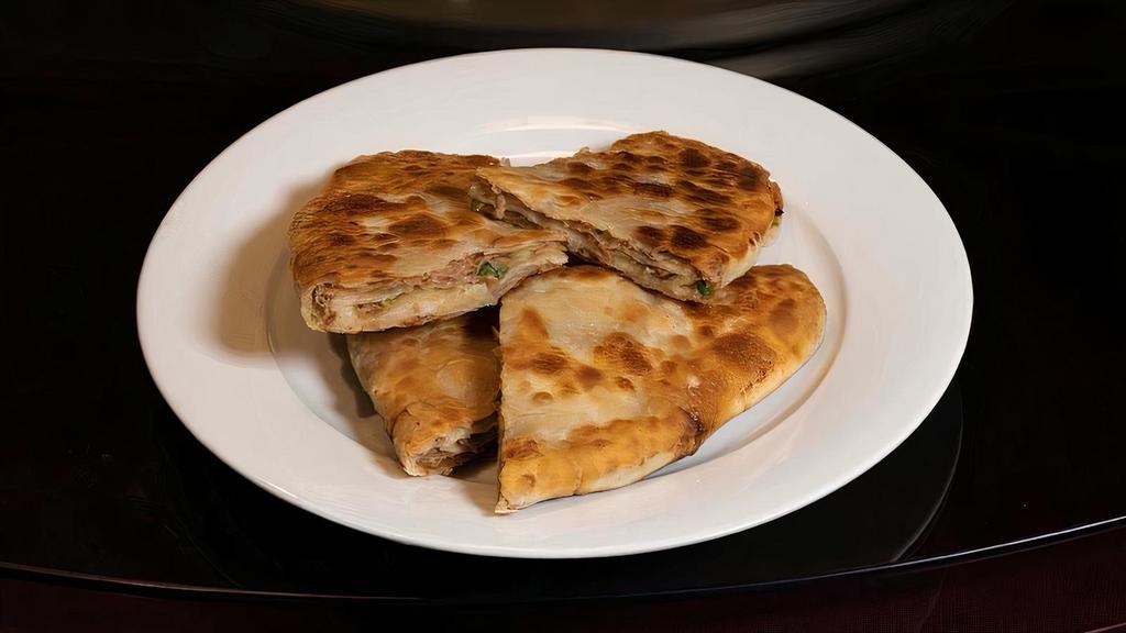 Meat Pancake (Pork) 猪肉饼 · Traditional Chinese meat crepe with a crispy wrapper and a soft, savory filling.