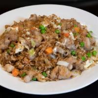 Chicken Fried Rice 鸡肉炒饭 · Egg, chicken, green beans, carrots, and slices of onion wok-fried with rice constitute this ...