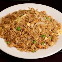 Vegetable Fried Rice 蔬菜炒饭 · Wok-fried rice cooked with slices of caramelized white onions, snow peas, carrots, and egg.