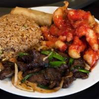 Mongolian Beef & Sweet And Sour Chicken Combination · Mongolian Beef and Sweet and Sour Chicken, both dripping with flavor, alongside an egg roll ...