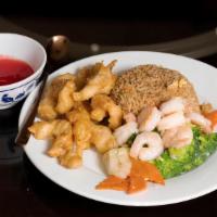 Shrimp With Vegetables Deluxe & Sweet And Sour Chicken Combination · Nutritious shrimp and assorted vegetable with sweet and sour chicken and an egg roll. This d...