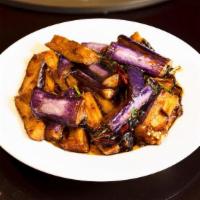 26-1. Spicy Eggplant 鱼香茄子 素 · Hot & Spicy. Colorful purple eggplants layered generously with spicy sauce before stir-fried...