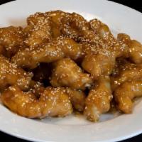 Honey Sesame Chicken 芝麻鸡 · Tender and boneless chicken glazed in sweet and sticky sauce, layered with sesame seeds.
