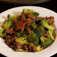 Beef With Fresh Broccoli 西兰花牛 · Tender beef slices heaped with a handsome portion of broccoli.