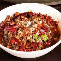 Beef In Spicy Soup 水煮牛 · A bold, hearty soup filled with beef slices and fiery hot peppers.