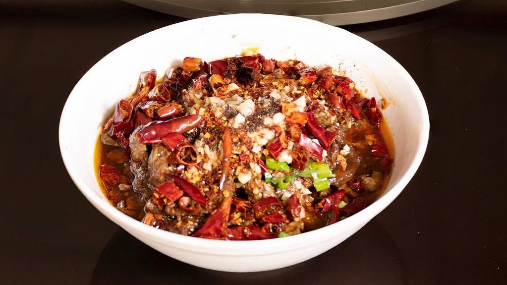 Beef In Spicy Soup 水煮牛 · A bold, hearty soup filled with beef slices and fiery hot peppers.