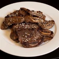 Kalbi 牛仔骨 · Korean-style short rips, cooked and seared to a succulent finish.