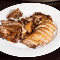 Crisp Duck 脆皮鸭 · Traditional Peking Duck slices roasted over fine flame, rendering out fat and leaving behind...