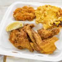 Chicken Wings · Batter dipped & deep fried wings with 2  sides & Bread ( All Portions are Large)