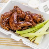 Flavored Wings · 6 Wings Deep Fried and Hand tossed in
our Signature Sauce of choice served w/ 2 Sides
(ALL P...