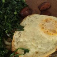 Tutu A Mineira · Mashed beans with cassava flour, served with collard greens, sausage, and fried egg. Served ...