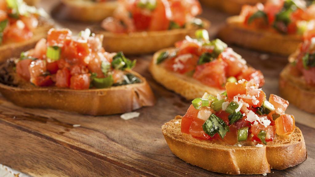 Bruschette Alla Fontana · Toasted bread with fresh chopped tomatoes, onions, garlic, basil, and extra virgin olive oil.