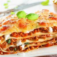 Lasagna Bolognese · Layer of Italian pasta stuffed with meat sauce.