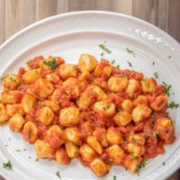 Gnocchi Pomodoro · Homemade potato pasta finished in a red marinara sauce.