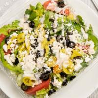 Greek Salad · Romaine lettuce served with tomatoes, cucumbers, banana peppers, peppers, onions, olives, an...