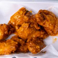 Chicken Wings · 8 pc of fresh marinated fried wings. 
(No batter/breading)