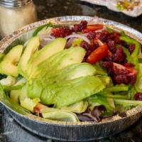 Southwest Salad · Garden salad topped with avocado and dried cranberry served with raspberry fat free dressing.