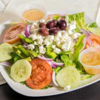 Greek Salad · Lettuce, cucumber, tomato, red onion, green pepper, feta cheese, kalamata olives.