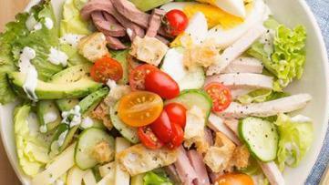 Chef Salad · Tossed salad topped with hard boiled egg, turkey, provolone cheese, imported ham and croutons.