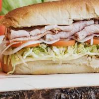 Haines St · Thinly sliced oven gold turkey, provolone, capicola ham, lettuce, tomato, and russian dressing