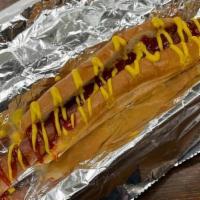 Foot Long Hot Dog · Footlong grilled hot dog in a buttery toasted bun! Top it as you like.