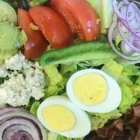 Cobb Salad · Iceberg Lettuce, Romaine Lettuce, Hard Boiled Egg, Bacon, Tomato Wedges, Sliced Cucumber, Sl...
