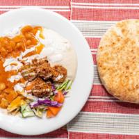 Adeas Lunch Plate · Rice, bean Soup, Salad, Hummus, Falafel/ pita on side.