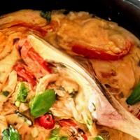 Red Curry  · Spicy. Bamboo shoots, eggplant, green beans, bell peppers, and Thai basil with a red curry s...