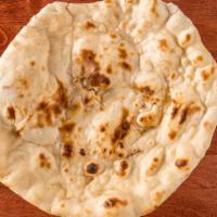 Naan · Leavened flat bread cooked in a clay oven.
