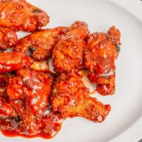 Korean Wings (6 Pcs.) · Wingding with special Korean spicy and sweet sauce.