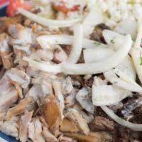 Shawarma Mix Plate · Mix of lamb & chicken over rice & cucumber salad.