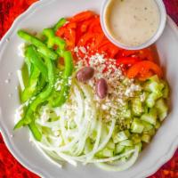 Greek Salad · Romaine lettuce, green peppers, cucumbers, black olives, feta cheese, with Greek dressing.