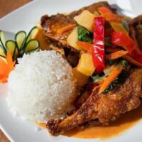 Chu Chee Duck (Spicy) · Half Duck, Red Curry, Bell Pepper, Thai Basil, Pineapple