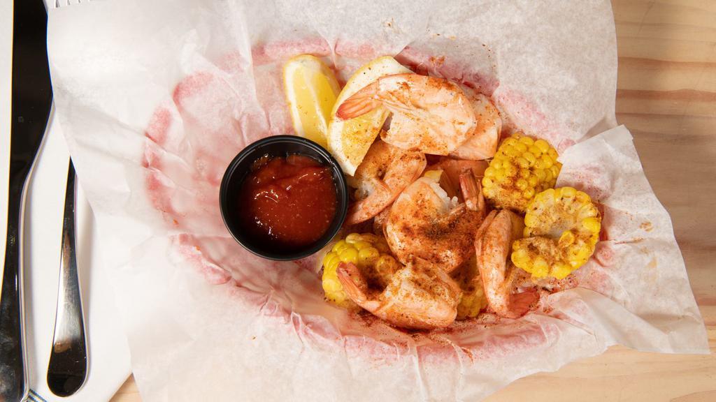 Peel 'N' Eat Shrimp · With Cocktail Sauce, a Half Pound.