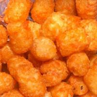 Mini Bucket Sweet Tots · Small side of Sweet potato tater tots. The best sweet potato tots served with house made hon...