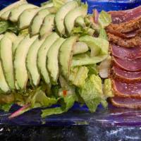 Peppered Tuna Salad · Sliced peppered tuna on top of avocado, lettuce and spring mix with house special sauce.