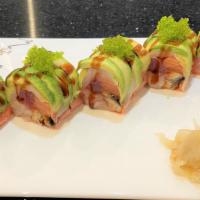 Holiday Sashimi Roll (No Rice With Soy Paper) · Top: a layer of avocado with sliced white tuna and wasabi tobiko. Middle: tuna, salmon, yell...