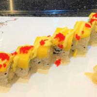 Hawaiian Roll (8 Pieces) · Inside: shrimp tempura and avocado. Top: mango, mango sauce, and masago.