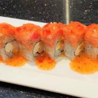 Fantasy Roll (8 Pieces) · Inside: kani tempura and cream cheese. Top: spicy tuna and sweet chili sauce.